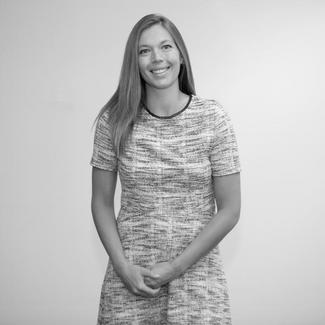 A smiling woman with long hair. 